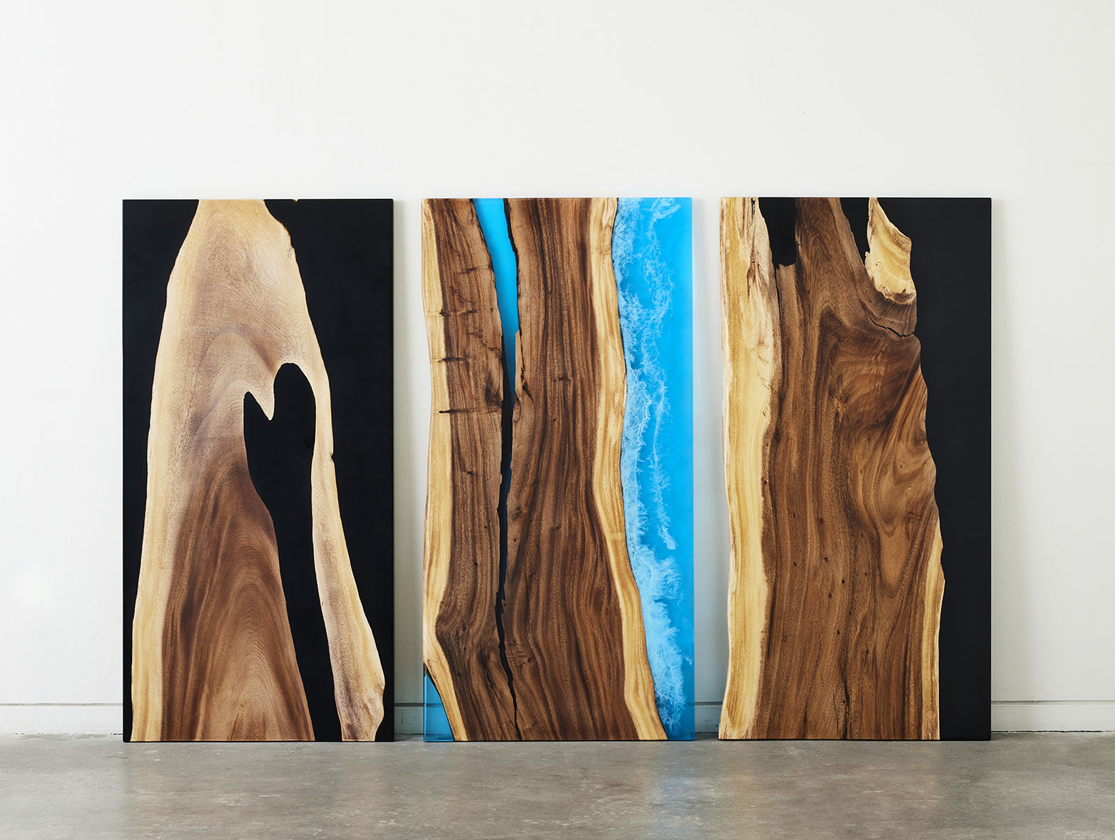 RISE live edge epoxy standing desks in blue and black